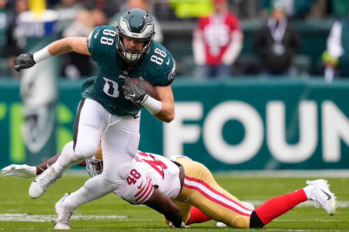 Philadelphia Eagles tight end Dallas Goedert (88) runs with the ball as San Francisco 49ers lin ...