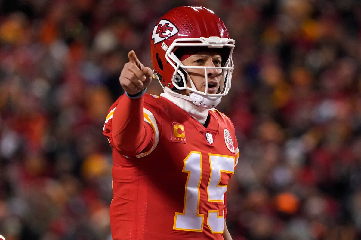 Kansas City Chiefs quarterback Patrick Mahomes signals teammates during the first half of the N ...