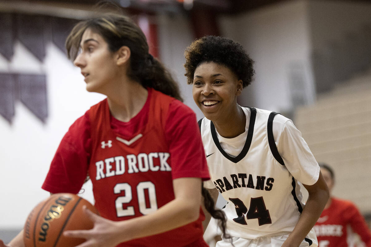 Cimarron-Memorial’s Maya Hobbs (24) smiles after scoring while Doral’s Omta Anoya ...