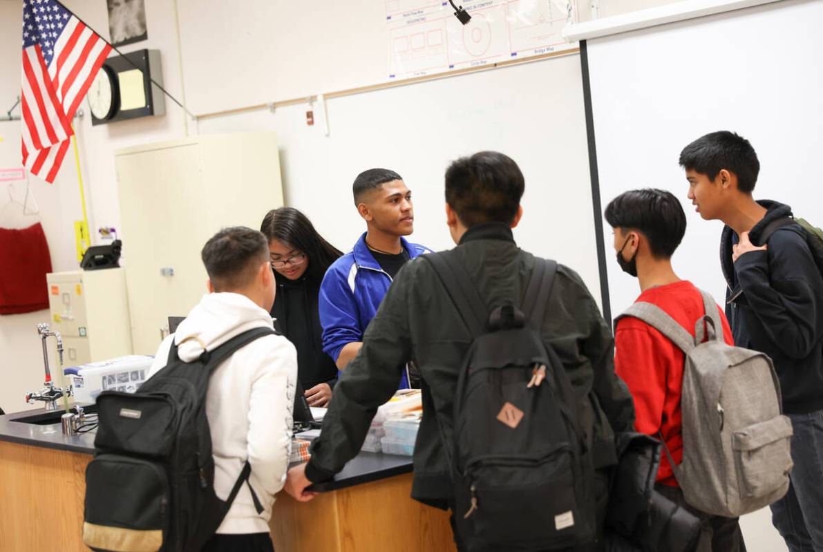 Junior Jodani Paris, project manager in the U.S. Space Force Junior ROTC program class, talks w ...