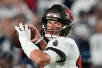 Tampa Bay Buccaneers quarterback Tom Brady (12) passes against the Dallas Cowboys during an NFL ...