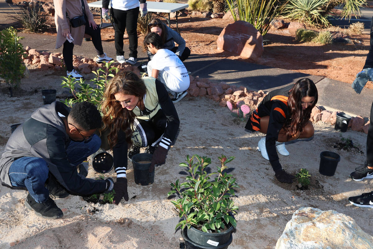 NFL cheerleaders and children with the Boys & Girls Clubs of Southern Nevada participate during ...