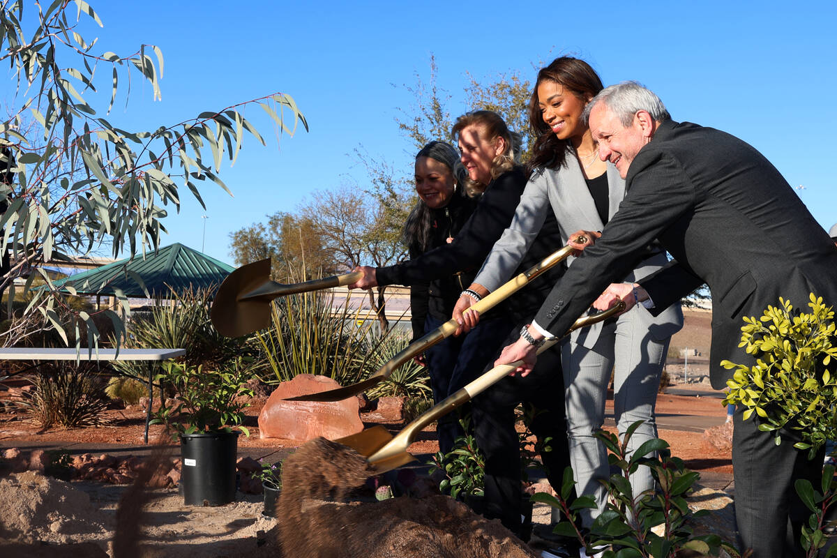 Kuulei Jakubczak, director of government and community affairs for Verizon, from left, Susan Gr ...