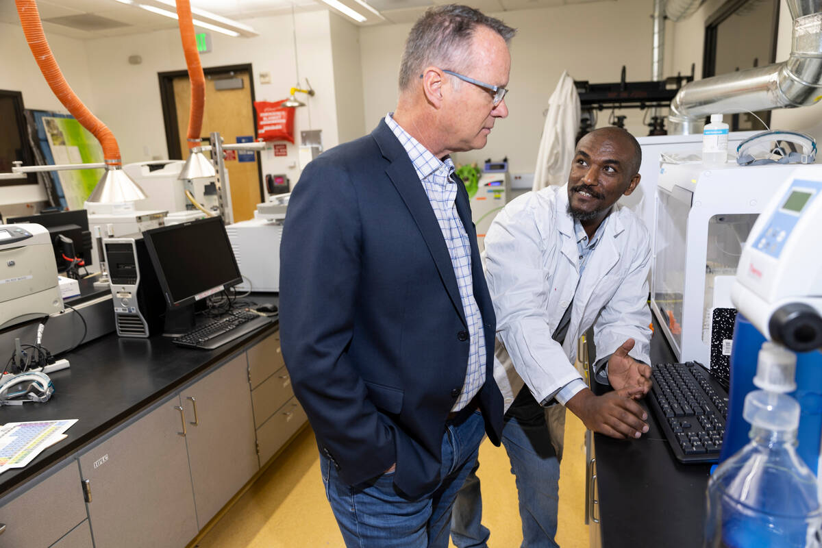 Professor Doug Sims, left, dean for the College of Southern Nevada School of Science, Engineeri ...