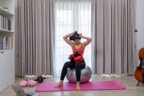 To build a home gym in a small space, start with a mat, stability ball, kettlebells and dumbbel ...