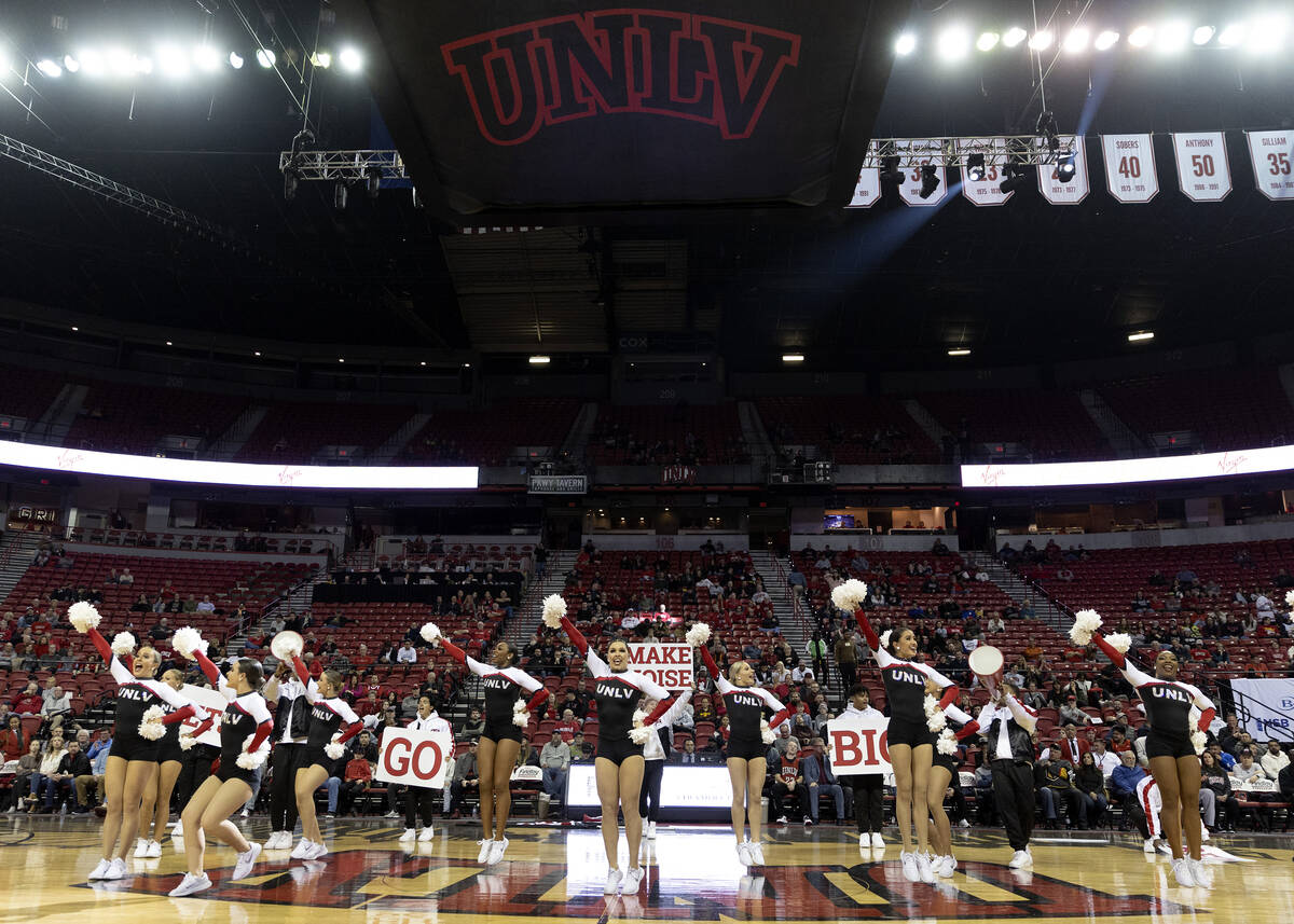 The Rebel Girls & Company perform during a timeout of a UNLV basketball game at the Thomas & Ma ...