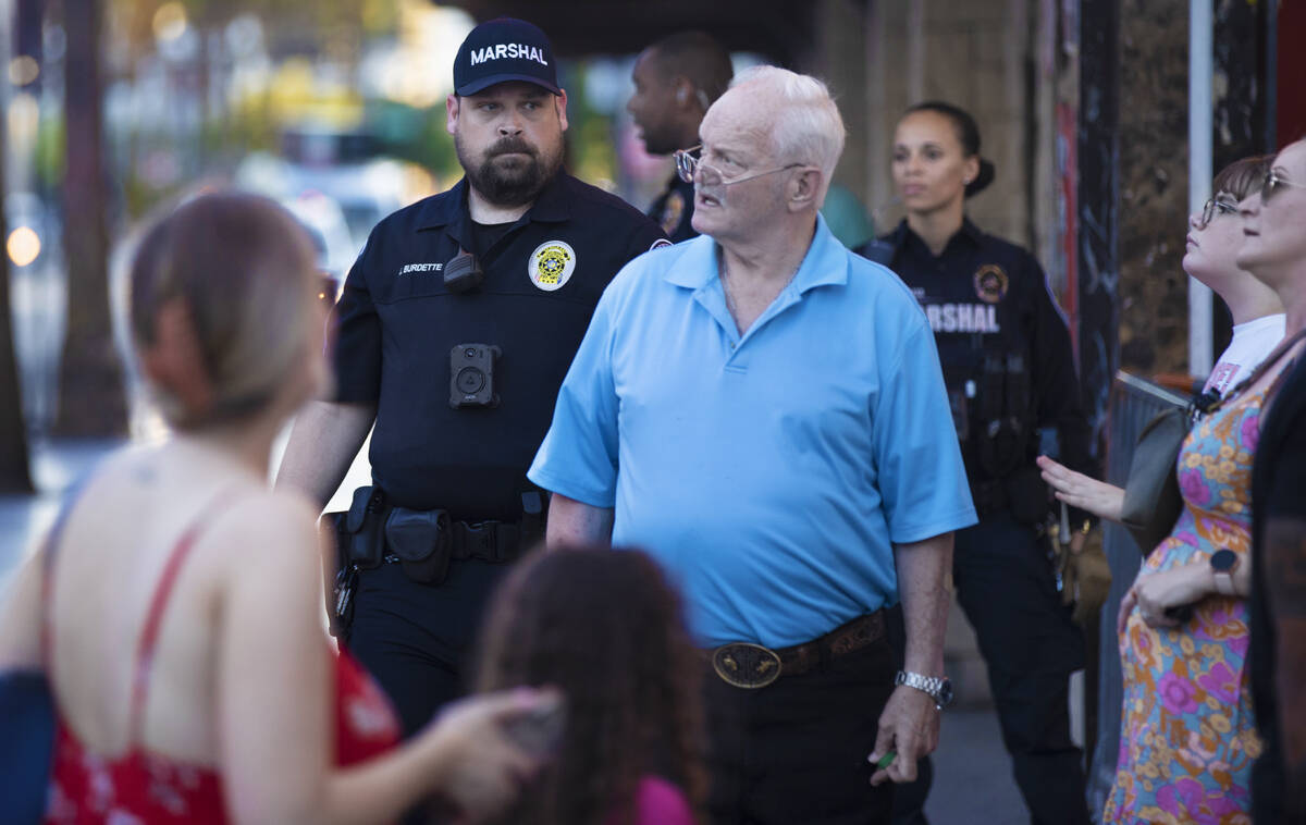 Deputies with the Las Vegas Marshals Office patrol the Fremont Street Experience on Saturday, J ...