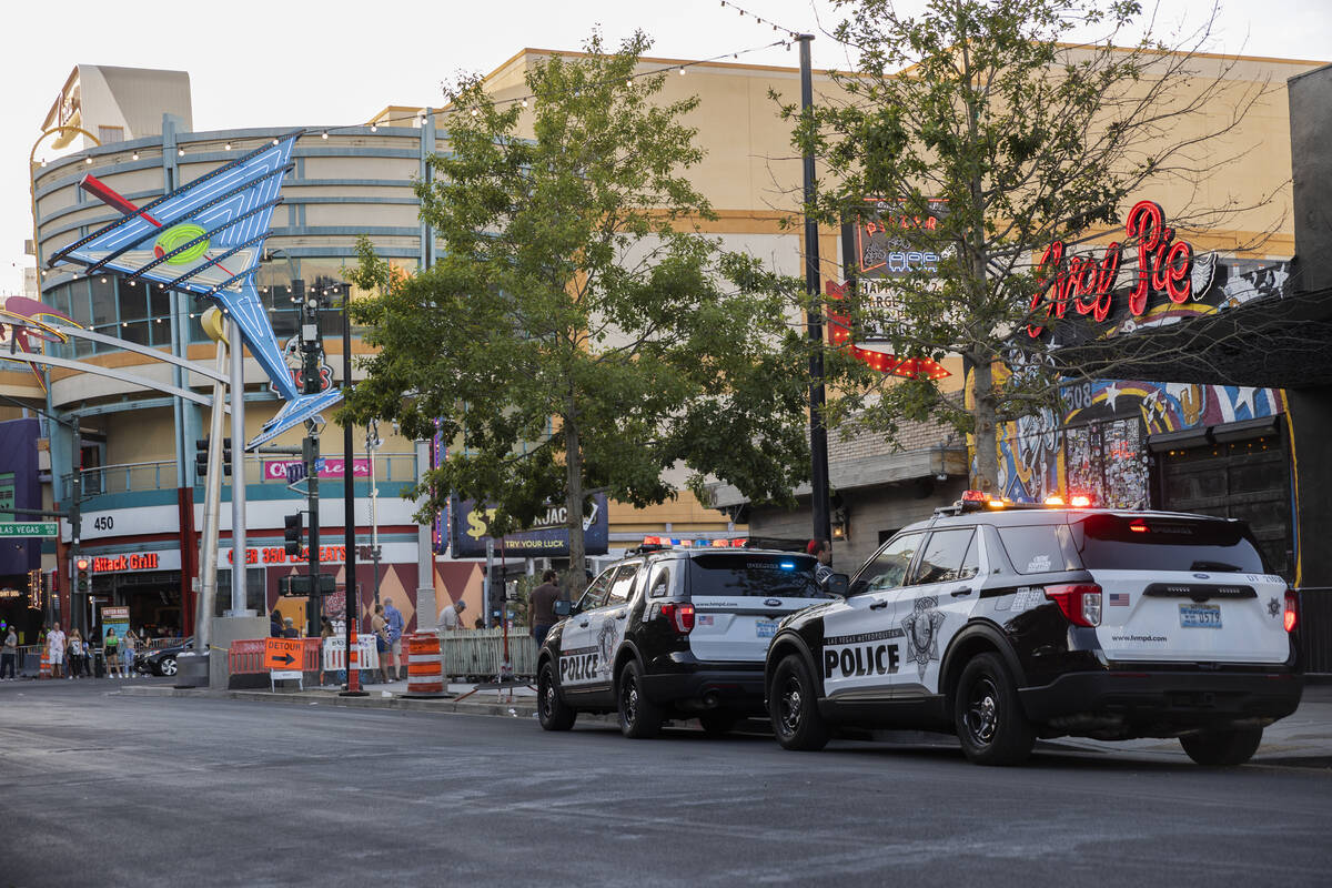 Las Vegas Metro officers park outside the Fremont Street Experience on Saturday, July 9, 2022, ...