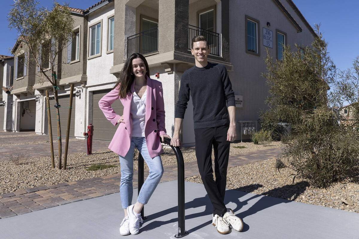 Lauren Self, co-founder and CEO of Roots Homes, and Sam Barsness, co-founder, pose for a photo ...