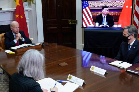 President Joe Biden meets virtually with Chinese President Xi Jinping from the Roosevelt Room o ...