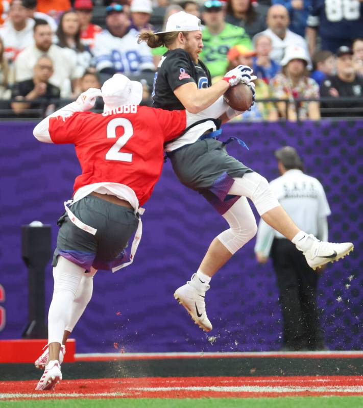 San Francisco 49ers tight end George Kittle (85) catches a pass under pressure from Miami Dolph ...