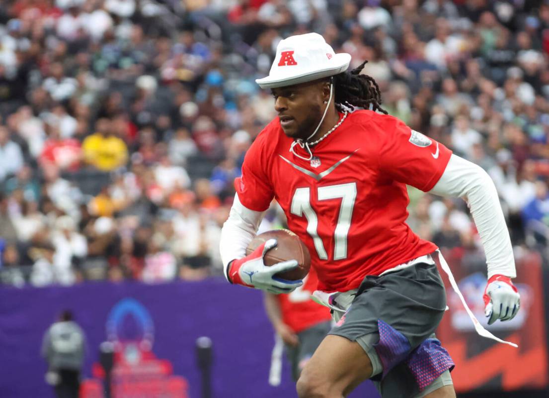 Las Vegas Raiders wide receiver Davante Adams (17) runs the ball during the NFL Pro Bowl Games ...