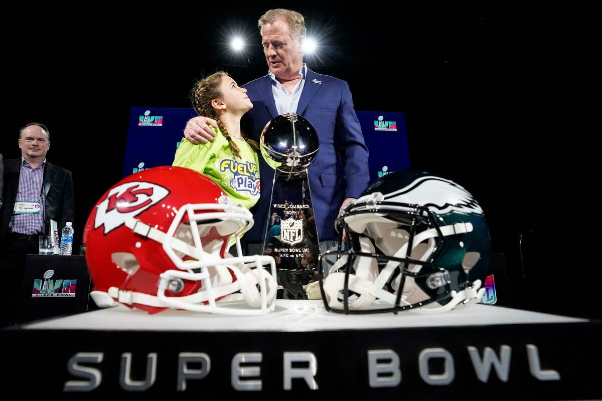 NFL Commissioner Roger Goodell poses for a photo with Play 60 Super Kid, Julia Crossly of Arizo ...