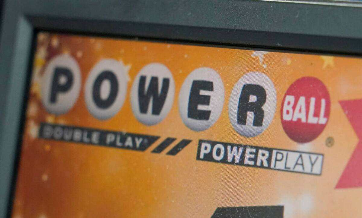 A display panel advertises tickets for a Powerball drawing at a convenience store, Nov. 7, 2022 ...