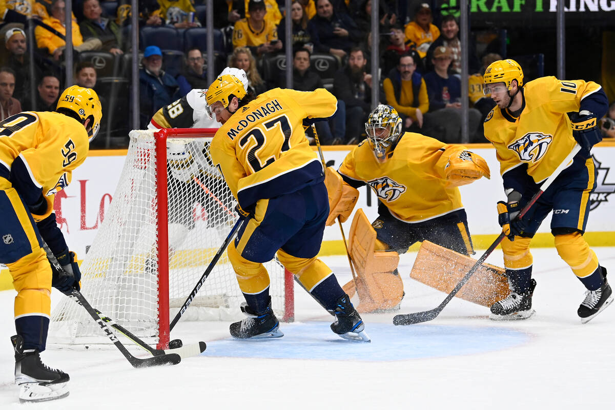 Nashville Predators defenseman Ryan McDonagh (27) tries to stop a goal by Vegas Golden Knights ...