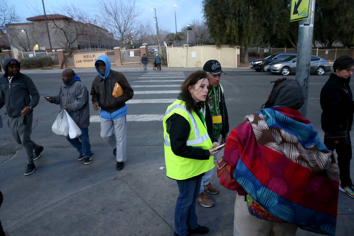 Homeless count volunteers Clark County Social Services grant administrator Shawna Thompson and ...