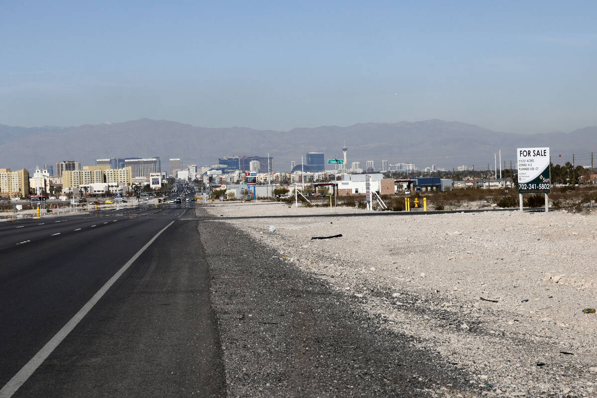 A piece of land, where a new apartment complex is slated to be built, is seen at the southeast ...