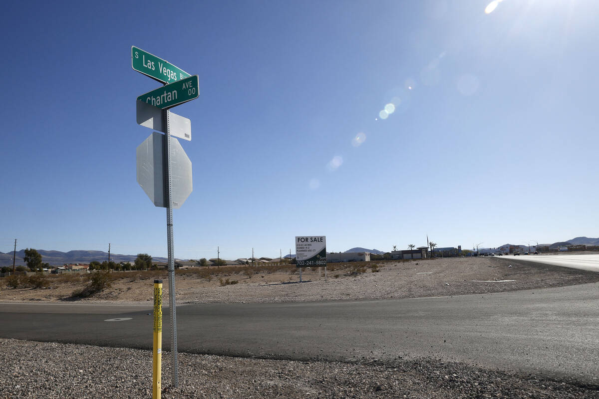 A piece of land, where a new apartment complex is slated to be built, is seen at the southeast ...