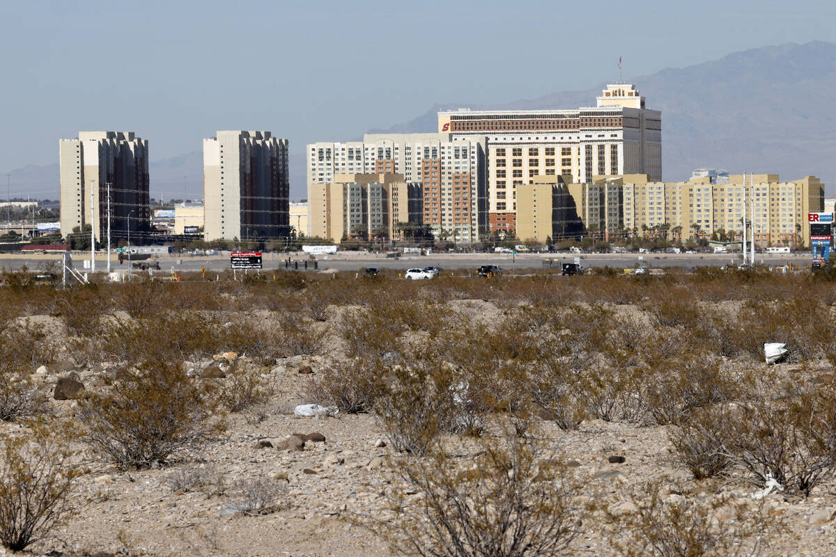 A piece of land, where a new apartment complex is slated to be built, is seen at the southeast ...