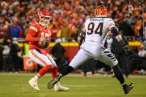 Kansas City Chiefs quarterback Patrick Mahomes (15) scrambles while under pressure from Cincinn ...