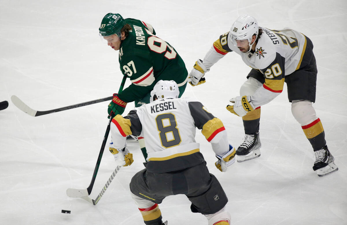 Minnesota Wild left wing Kirill Kaprizov (97) controls the puck in front of Vegas Golden Knight ...