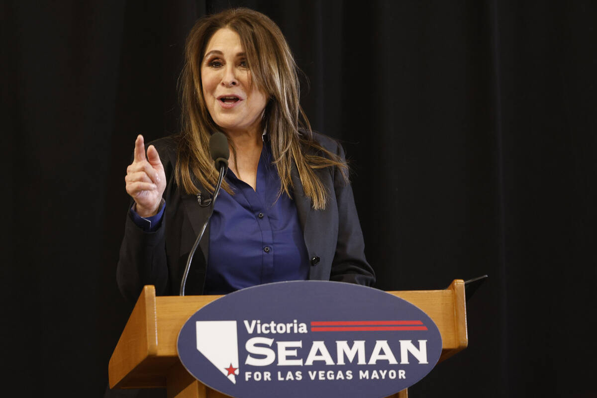 Las Vegas Councilwoman Victoria Seaman waves during a news conference to announce her bid to be ...