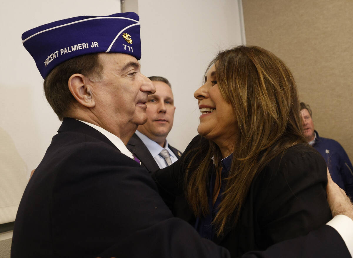 Las Vegas Councilwoman Victoria Seaman talks with Vietnam veteran Vincent Palmieri, Jr. after a ...