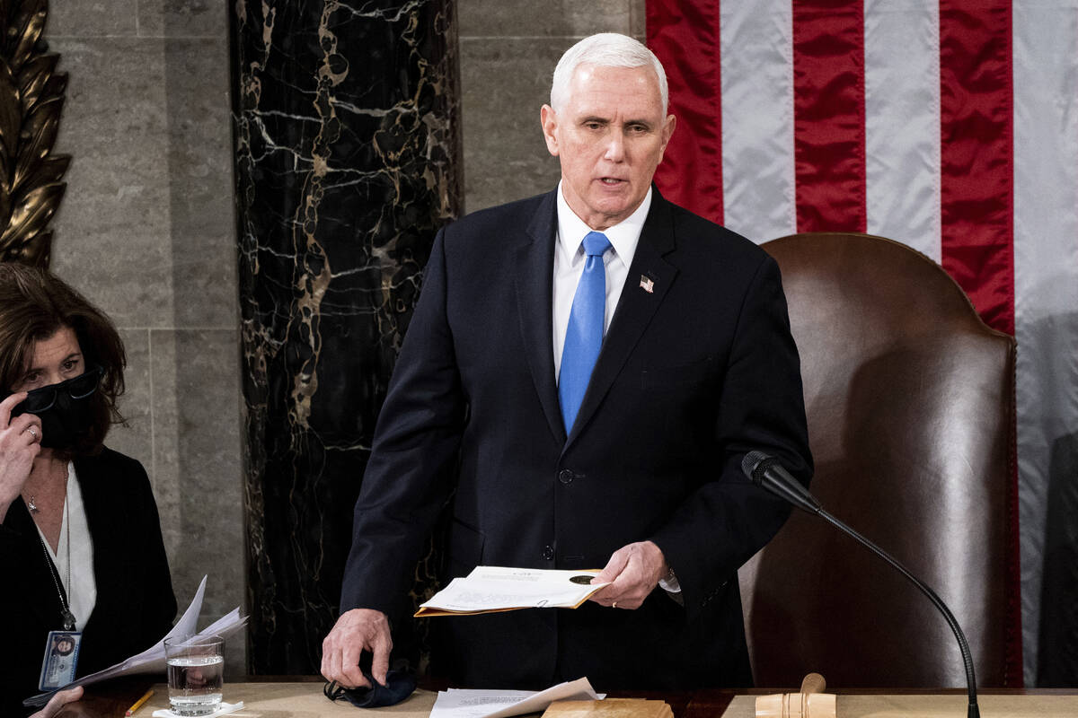 FILE - Vice President Mike Pence officiates as a joint session of the House and Senate convenes ...