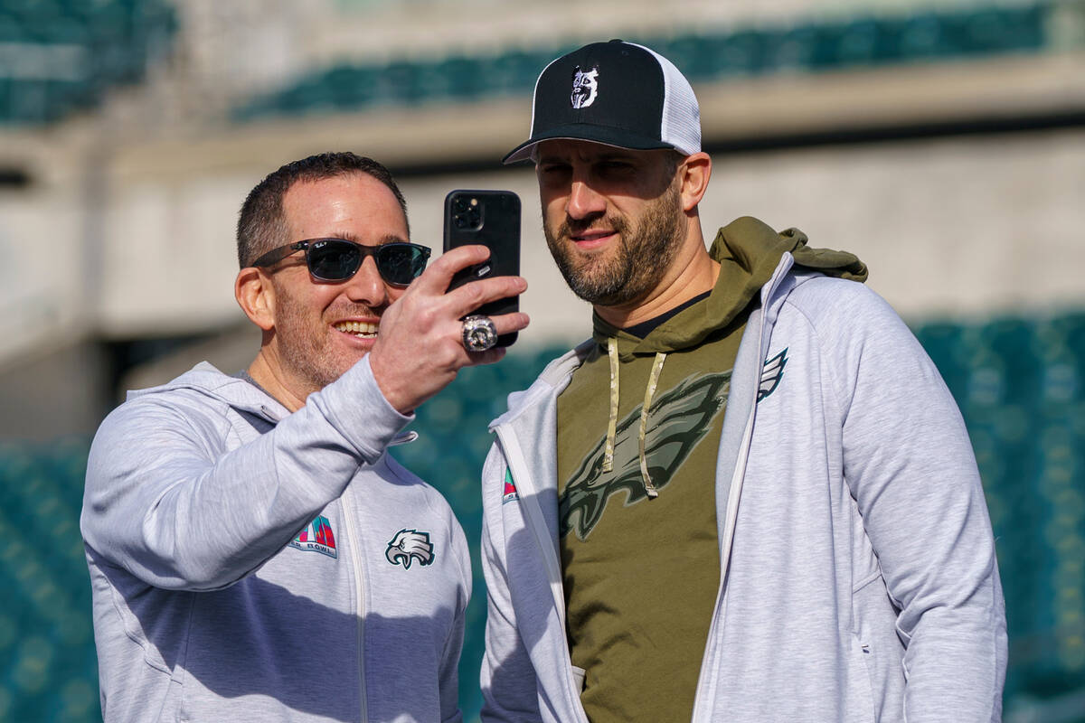 Philadelphia Eagles general manager Howie Roseman, left, looks on with head coach Nick Sirianni ...