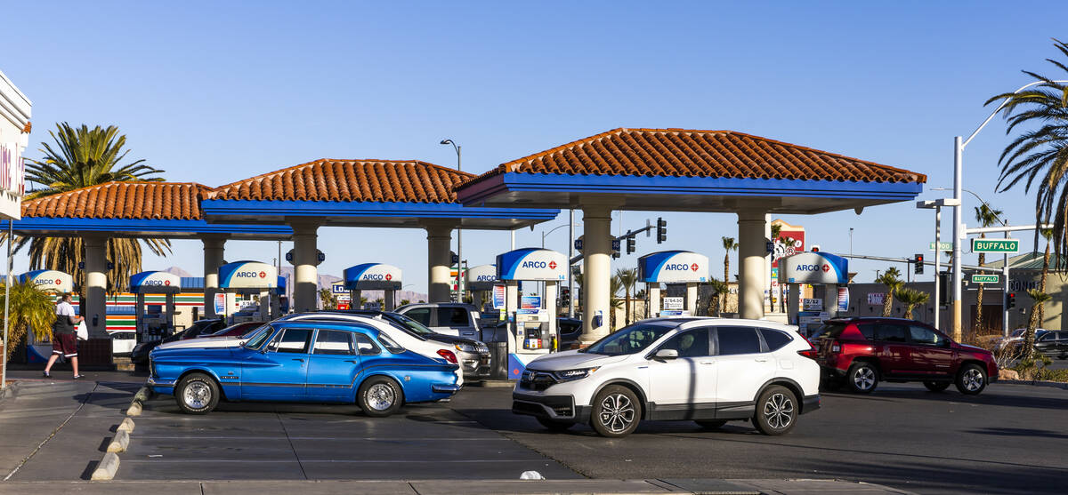 Customers fuel up at the Rebel gas station on North Buffalo Drive on Friday, Feb. 10, 2023, in ...