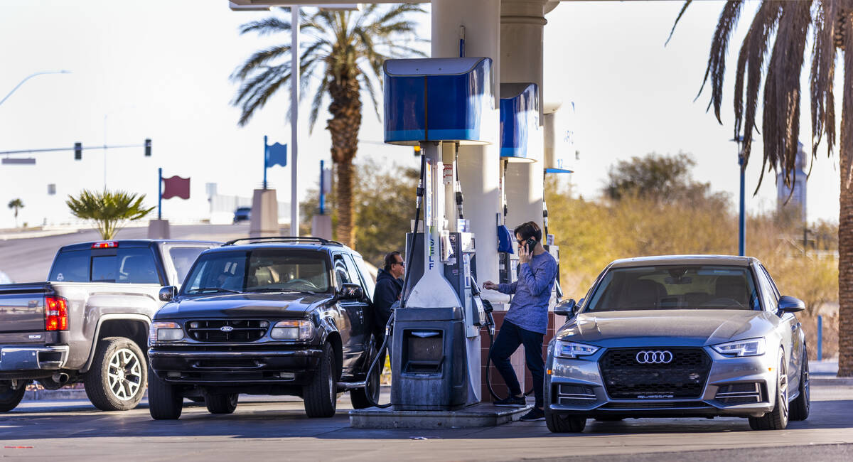 Customers fuel up at the Rebel gas station on North Buffalo Drive on Friday, Feb. 10, 2023, in ...