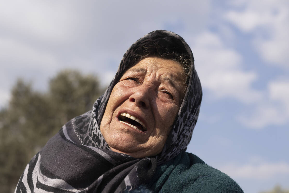 65 year-old Atari Kales mourns for her daughter in law and two grandchildren near the collapsed ...