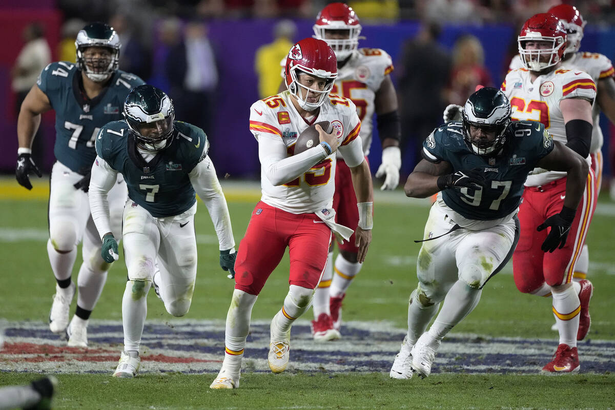 Kansas City Chiefs quarterback Patrick Mahomes (15) runs against the Philadelphia Eagles during ...