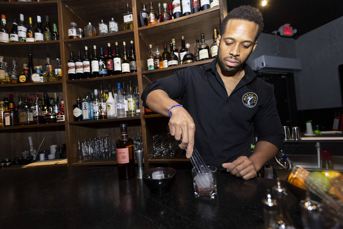 Bartender Paul Sanders prepares a Japanese Old Fashioned at Maxan Jazz in Las Vegas, Saturday, ...