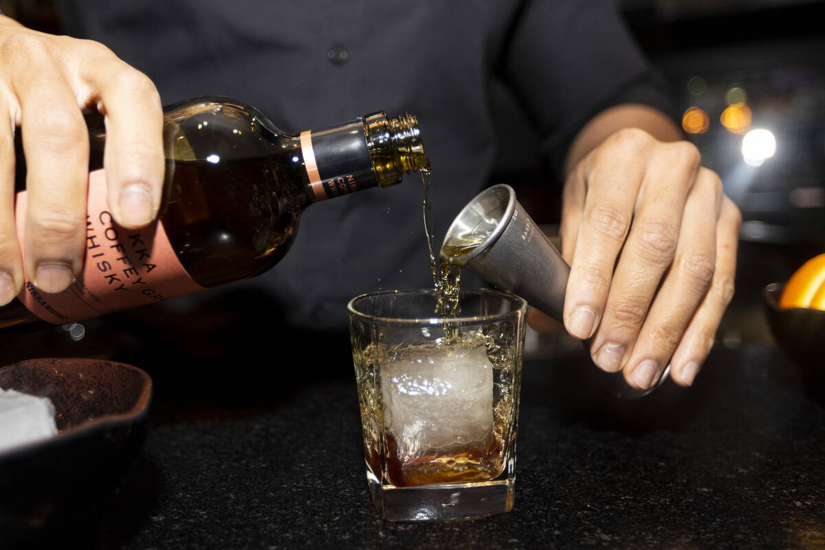 Bartender Paul Sanders prepares a Japanese Old Fashioned at Maxan Jazz in Las Vegas, Saturday, ...