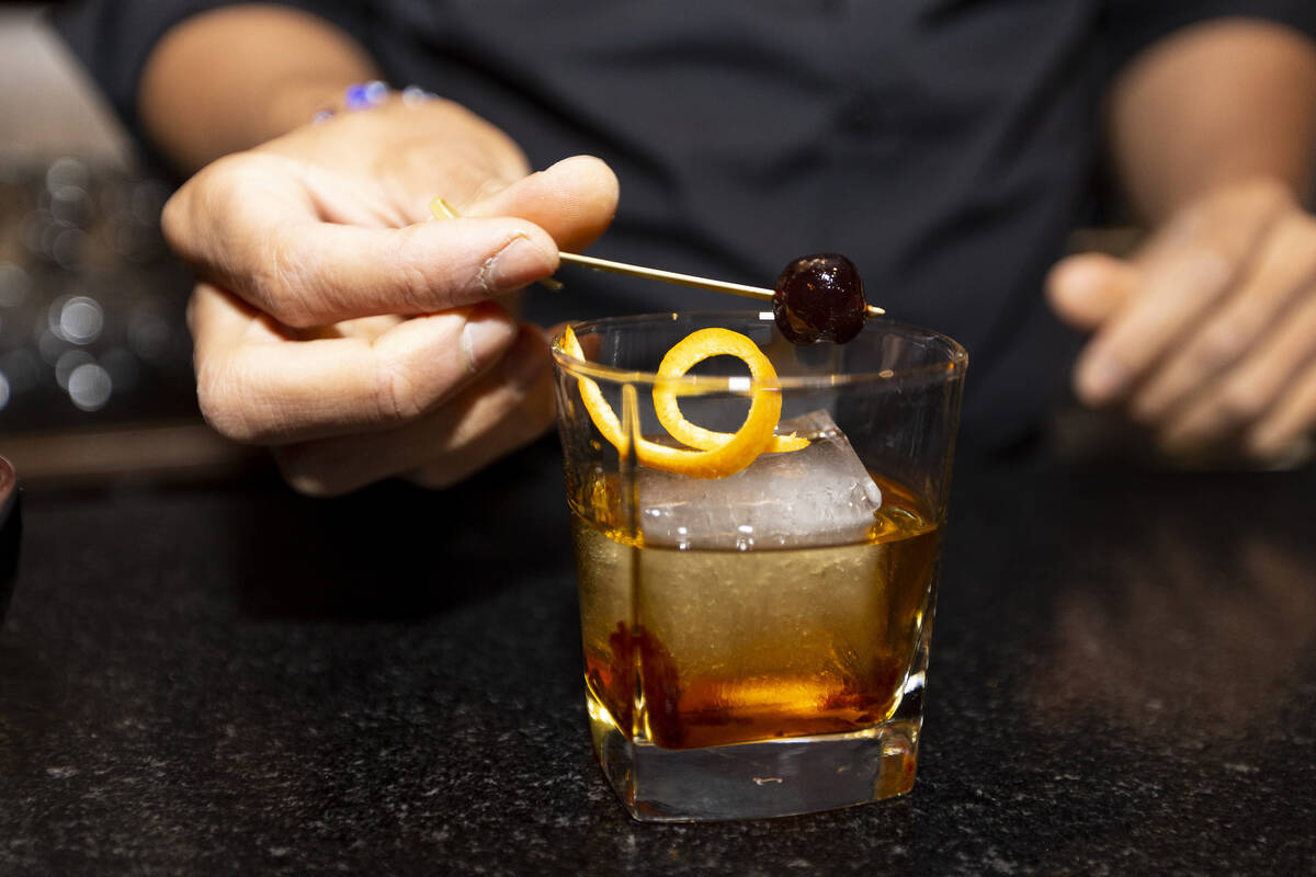 Bartender Paul Sanders prepares a Japanese Old Fashioned at Maxan Jazz in Las Vegas, Saturday, ...