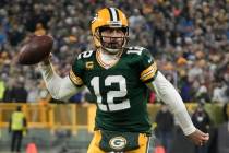 Green Bay Packers' Aaron Rodgers during the first half of an NFL football game against the Detr ...