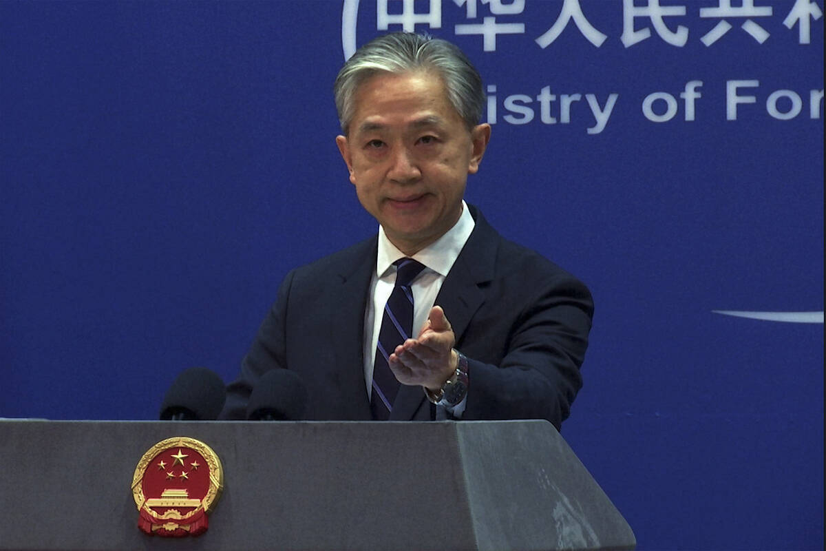 In this image made from video, Chinese Foreign Ministry spokesperson Wang Wenbin speaks during ...