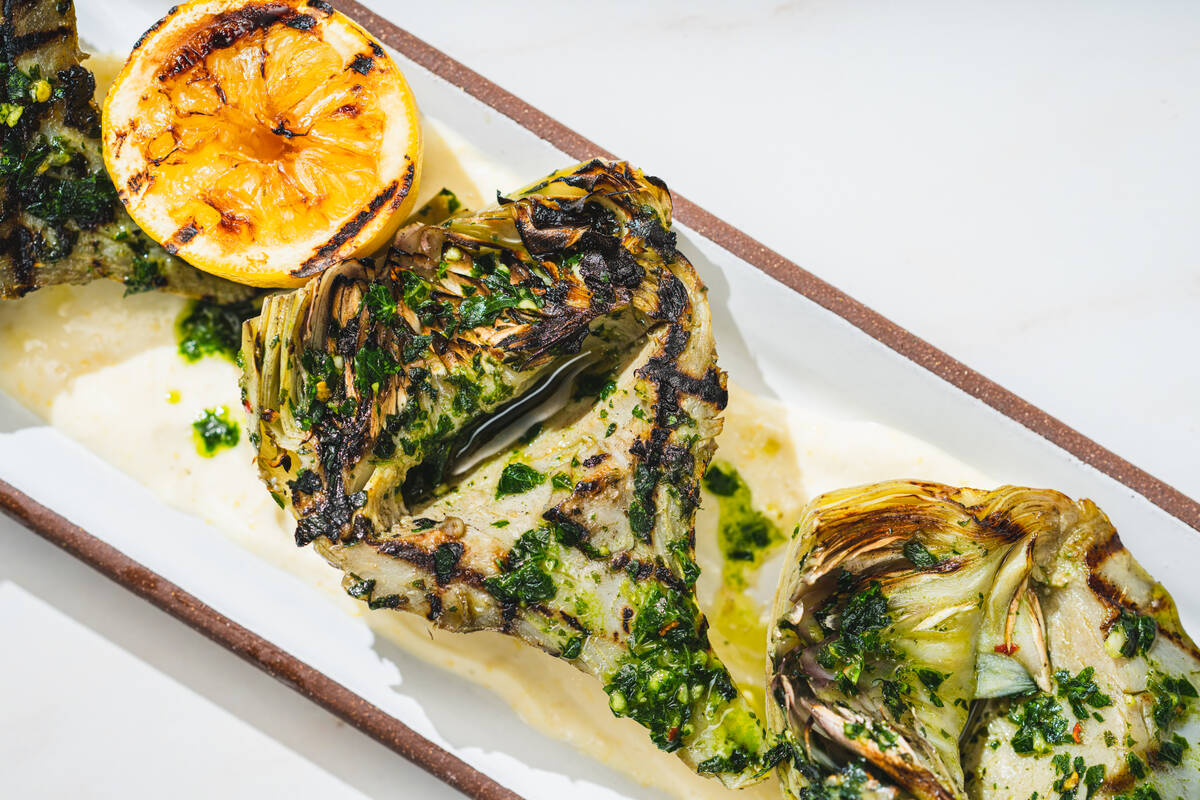 Wood-fire artichokes from Naxos Taverna in Red Rock Resort in the Summerlin area of Las Vegas. ...