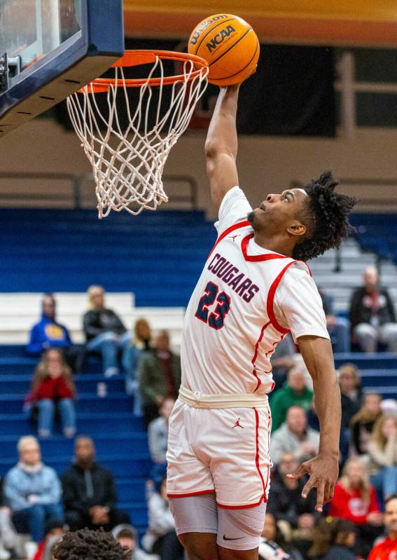 Coronado's Josiah Cunningham (23)dunks the ball on a fast break against Arbor View during the f ...