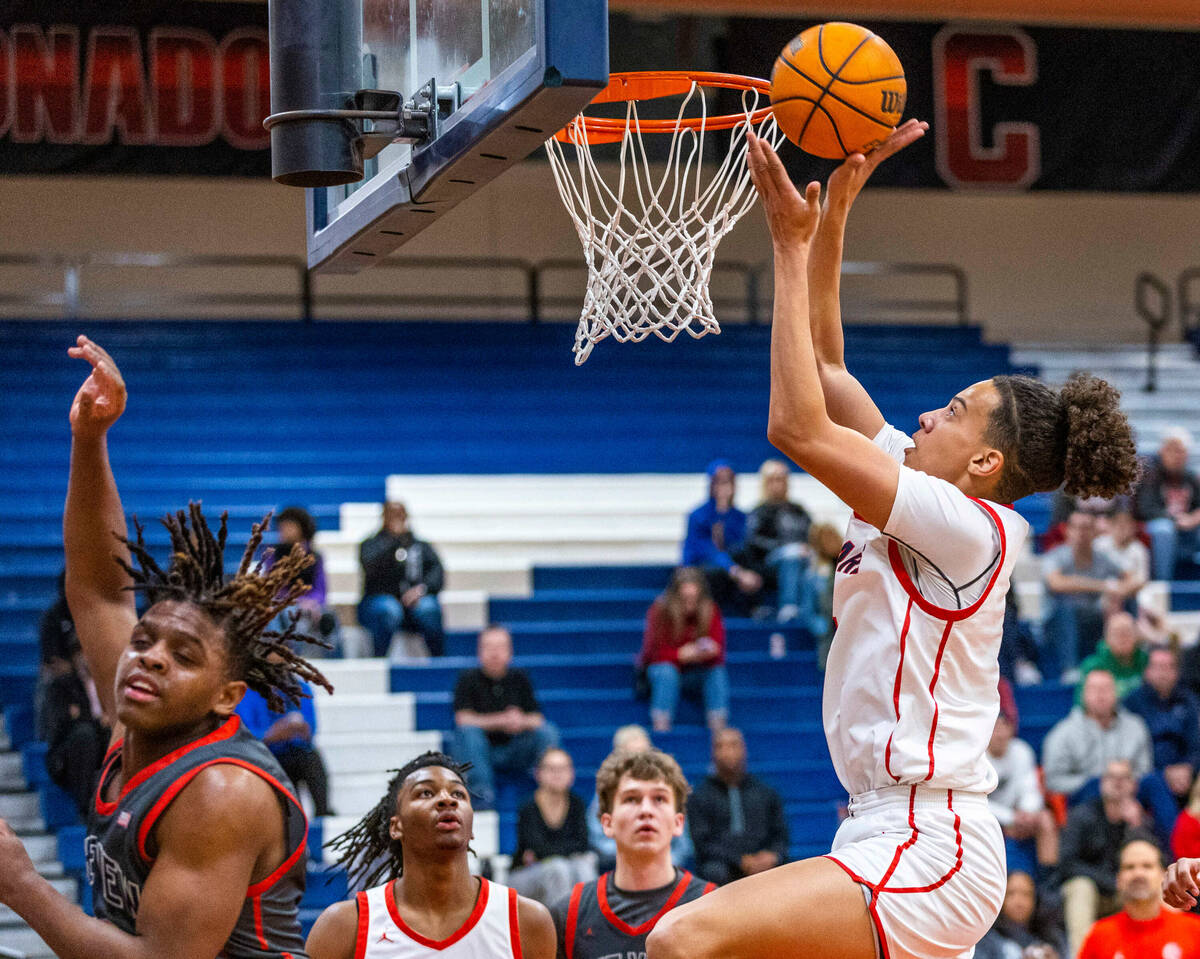 Coronado's scores above Arbor View's Brian Townsend (3) during the first half of their NIAA Cla ...