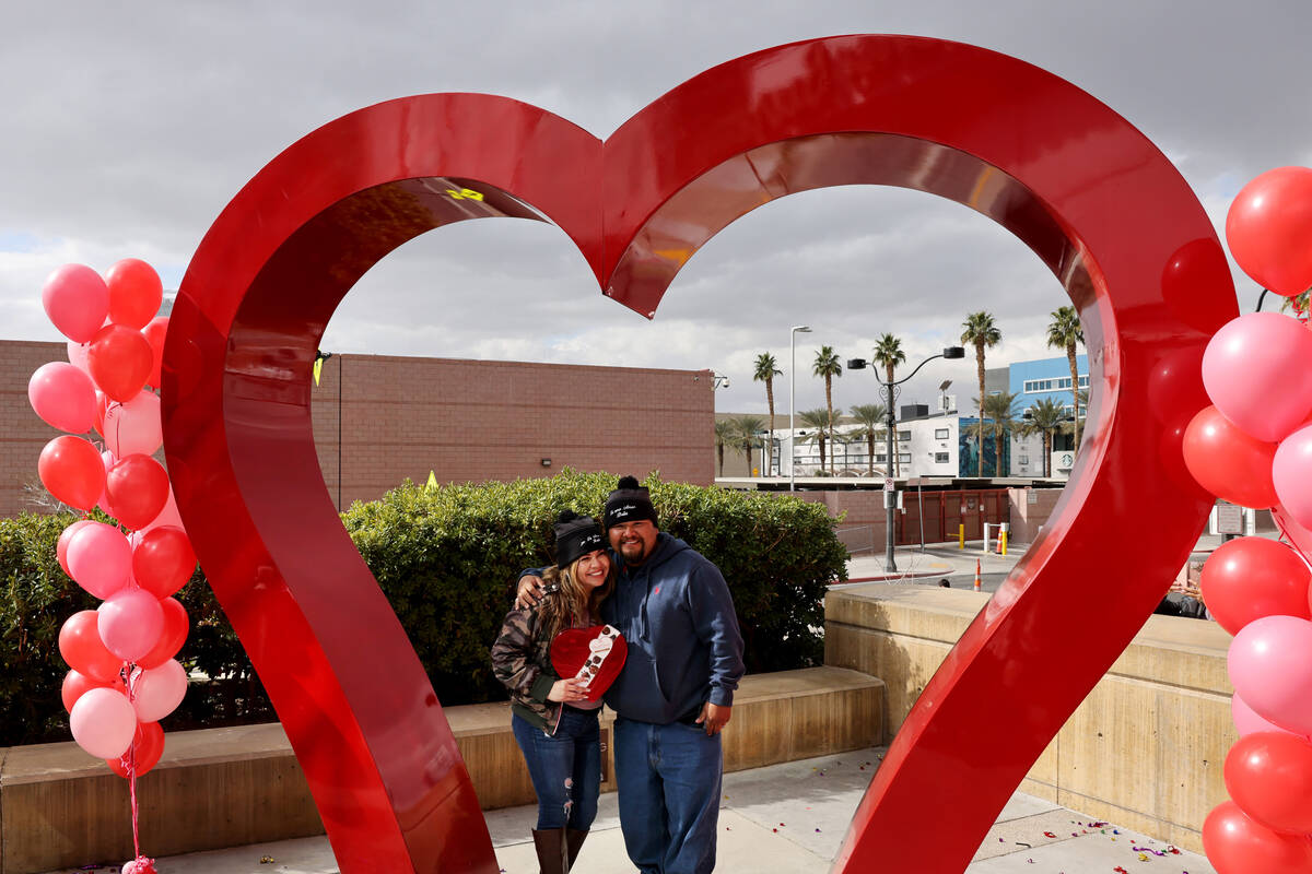 Wedding couple MarBella and Raul Moreno of San Diego are seen during an unveiling ceremony for ...