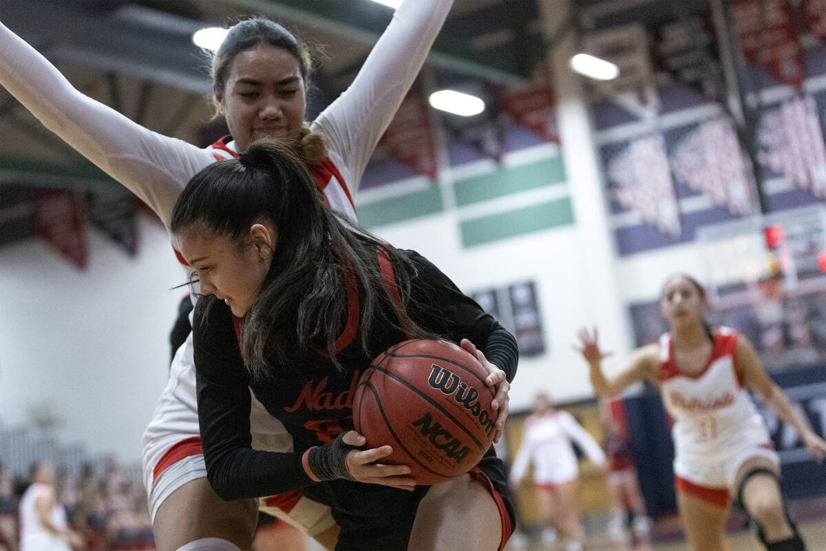 Coronado’s Gabrielle De La Cruz (23) looks for a way around Liberty’s Adrienne Pu ...