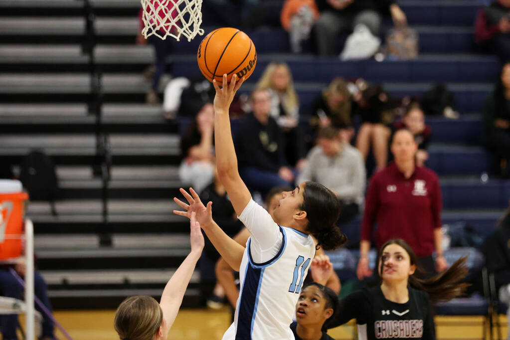 Centennial's Danae Powell (11) takes a shot against Faith Lutheran during a girls class 5A sout ...