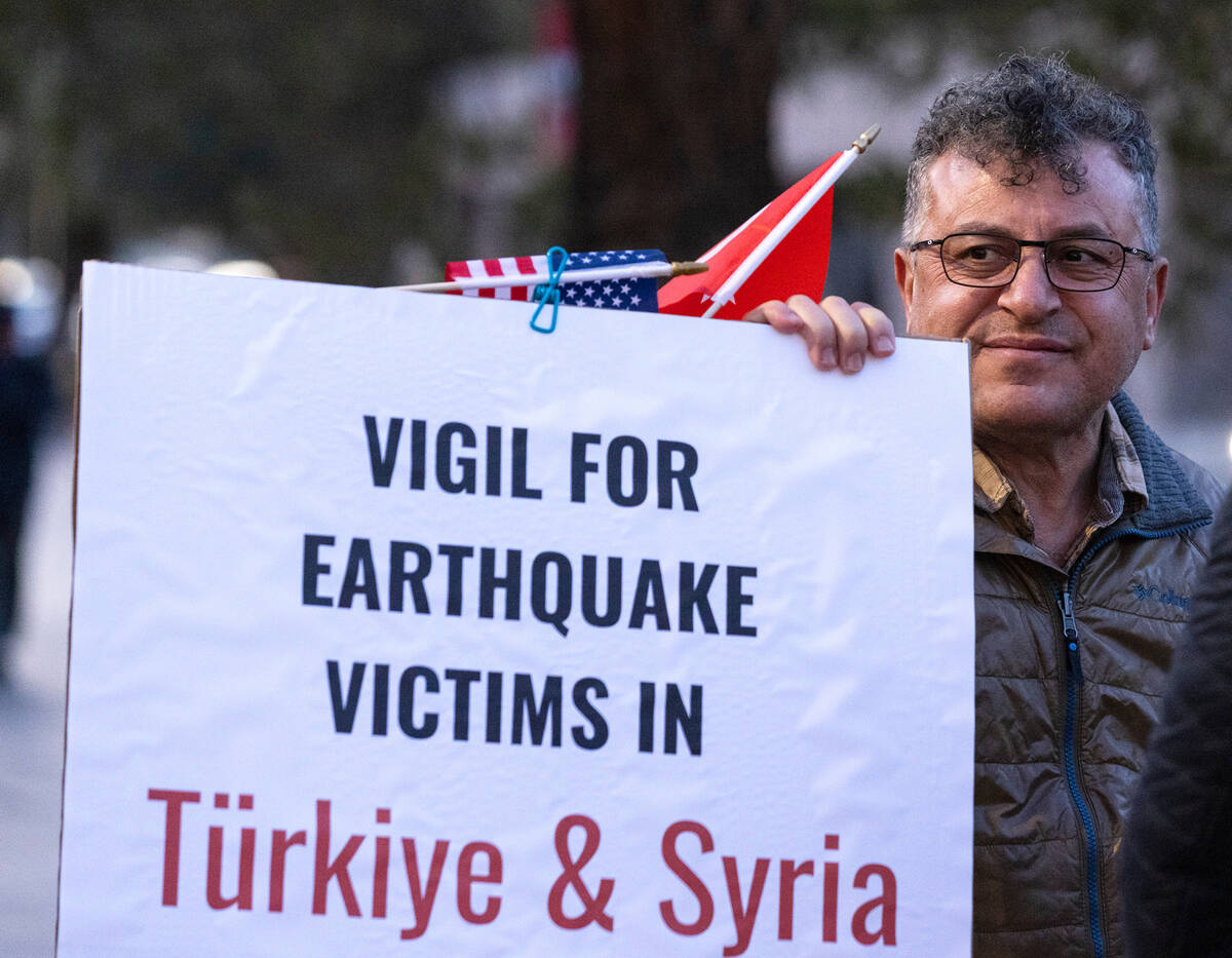 Seyhmus Baloglu of Las Vegas participates in a candlelight vigil to honor and remember the eart ...