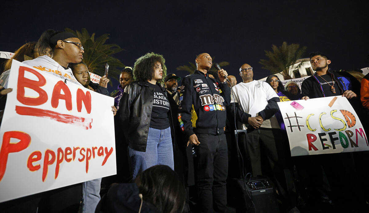 De’Mahj Solomon, 16, 10th grader of Desert Oasis High School, center, speaks during a r ...