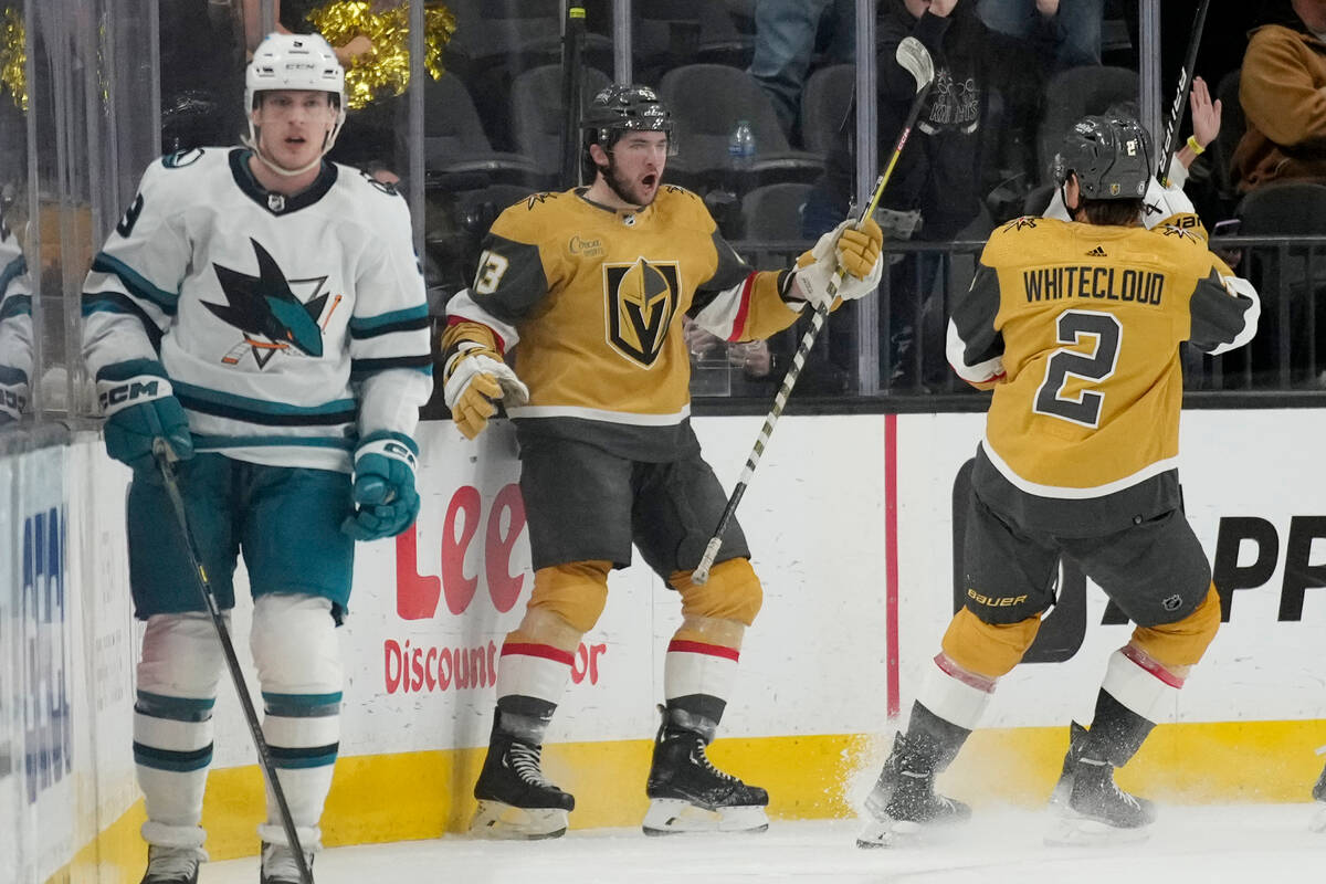 Vegas Golden Knights center Paul Cotter, center, celebrates after scoring against the San Jose ...