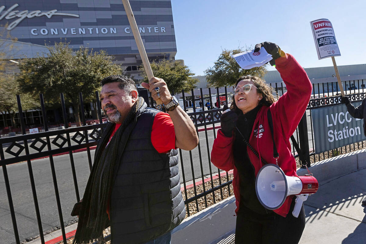 Diamante Asberry, a researcher at Culinary Local 226, shouts slogans as Culinary union workers ...