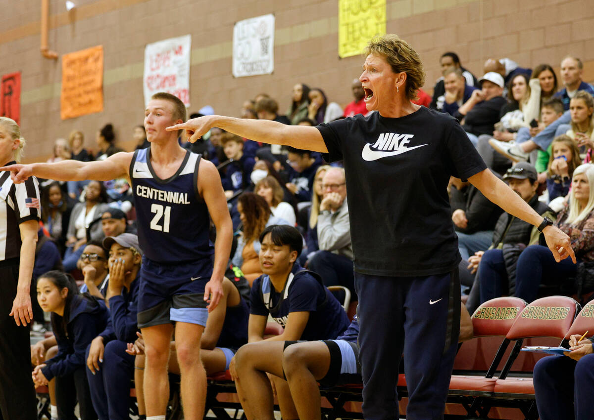 Centennial's head coach Karen Weitz, and Centennial's Kohlman Smith (21) gestures during the fi ...