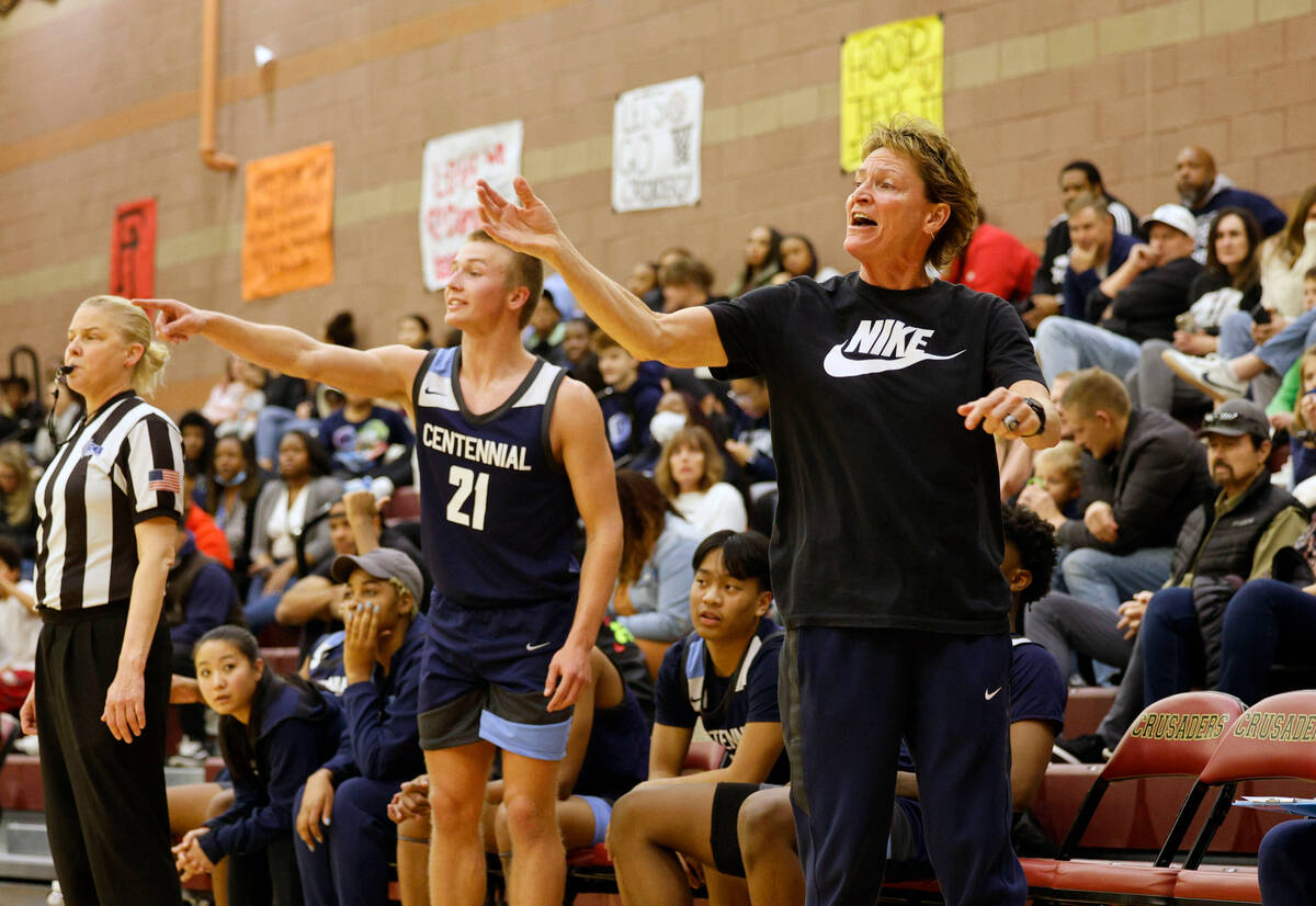 Centennial's head coach Karen Weitz, and Centennial's Kohlman Smith (21) gestures during the fi ...